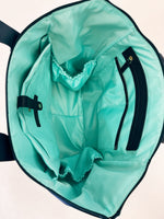 the reagan caryall tote in navy